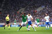 13 October 2024; Chiedozie Ogbene of Republic of Ireland in action against Konstantinos Mavropanos of Greece during the UEFA Nations League B Group 2 match between Greece and Republic of Ireland at Georgios Karaiskakis Football Stadium in Piraeus, Greece. Photo by Stephen McCarthy/Sportsfile