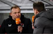 12 October 2024; Ulster head coach Richie Murphy is interviewed by TG4 analyst Darren Cave before the United Rugby Championship match between Ulster v Connacht at Kingspan Stadium in Belfast. Photo by Ramsey Cardy/Sportsfile