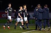 14 October 2024; Connor Malley, right, celebrates with Sligo Rovers team-mates Jack Henry-Francis, Ellis Chapman, left, and staff during the SSE Airtricity Men's Premier Division match between Derry City and Sligo Rovers at The Ryan McBride Brandywell Stadium in Derry. Photo by Stephen McCarthy/Sportsfile