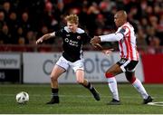 14 October 2024; Jack Henry-Francis of Sligo Rovers in action against Andre Wisdom of Derry City during the SSE Airtricity Men's Premier Division match between Derry City and Sligo Rovers at The Ryan McBride Brandywell Stadium in Derry. Photo by Stephen McCarthy/Sportsfile