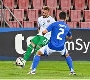 15 October 2024; Sam Curtis of Republic of Ireland in action against Mattia Zanotti of Italy during the UEFA European U21 Championship qualifier match between Italy and Republic of Ireland at Stadio Nereo Rocco in Trieste, Italy. Photo by Igor Kupljenik/Sportsfile