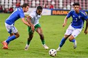 15 October 2024; Aidomo Emakhu of Republic of Ireland in action against Riccardo Turicchia, left, and Cher Ndour of Italy during the UEFA European U21 Championship qualifier match between Italy and Republic of Ireland at Stadio Nereo Rocco in Trieste, Italy. Photo by Igor Kupljenik/Sportsfile