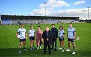 17 October 2024; Dublin GAA and Staycity Aparthotels have revealed their new alternate kit that will be worn in select matches throughout the 2025 and 2026 seasons. In attendance at Parnell Park to launch the jersey are, from left, footballer Sean McMahon, ladies footballer Leah Caffrey, UK/Ireland marketing manager Olga Pull, managing director Keith Freeman, director of brand & marketing Jason Delany, camogie player Emma O’Byrne and hurler Paddy Smyth. The jersey is designed to pay homage to the city's famous landmarks and rich cultural history. Photo by Sam Barnes/Sportsfile