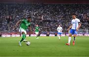 13 October 2024; Chiedozie Ogbene of Republic of Ireland in action against Dimitris Giannoulis of Greece during the UEFA Nations League B Group 2 match between Greece and Republic of Ireland at Georgios Karaiskakis Football Stadium in Piraeus, Greece. Photo by Stephen McCarthy/Sportsfile