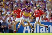 15 August 2004; Adrian Fenlon, Wexford, in action against Kieran Murphy, left, and Jerry O'Connor. Guinness Senior Hurling Championship Semi-Final, Wexford v Cork, Croke Park, Dublin. Picture credit; Ray McManus / SPORTSFILE