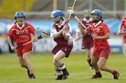 21 August 2004; Lorraine Lally, Galway, in action against Jennifer O'Leary,left, and Vivienne Harris, Cork. Foras na Gaeilge Senior Camogie Championship Semi-Final, Galway v Cork, Nowlan Park, Kilkenny. Picture credit; Matt Browne / SPORTSFILE
