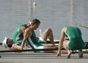 22 August 2004; Dejected members of the Irish team, from left, Eugene Coakley, Richard Archibald, Niall O'Toole and Paul Griffin after finishing 6th in the Final of the Men's Lightweight Coxless Fours in a time of 6.09.96. Schinias Olympic Rowing Centre. Games of the XXVIII Olympiad, Athens Summer Olympics Games 2004, Athens, Greece. Picture credit; Brendan Moran / SPORTSFILE