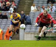 22 August 2004; Odran O'Dwyer, Clare, punches the ball  past the Sligo goalkeeper James Curran to score a goal. Tommy Murphy Cup Final, Clare v Sligo, Croke Park, Dublin. Picture credit; Ray McManus / SPORTSFILE