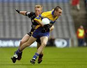 22 August 2004; Rory Donnelly, Clare, in action against Colin Neary, Sligo. Tommy Murphy Cup Final, Clare v Sligo, Croke Park, Dublin. Picture credit; Ray McManus / SPORTSFILE