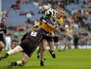 22 August 2004; Ger Quinlan, Clare, is tackled by Gary Maye, Sligo. Tommy Murphy Cup Final, Clare v Sligo, Croke Park, Dublin. Picture credit; Ray McManus / SPORTSFILE