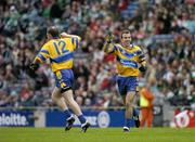 22 August 2004; Clare players Evan Talty, and Michael O'Shea, 12, celebrate victory over Sligo. Tommy Murphy Cup Final, Clare v Sligo, Croke Park, Dublin. Picture credit; Ray McManus / SPORTSFILE