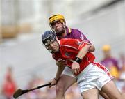 15 August 2004; Ronan Curran, Cork, in action against Eoin Quigley, Wexford. Guinness Senior Hurling Championship Semi-Final, Wexford v Cork, Croke Park, Dublin. Picture credit; Brian Lawless / SPORTSFILE
