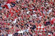 15 August 2004; Cork fans during the game. Guinness Senior Hurling Championship Semi-Final, Wexford v Cork, Croke Park, Dublin. Picture credit; Brian Lawless / SPORTSFILE