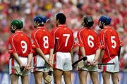 15 August 2004; Cork players stand for the National Anthem. Guinness Senior Hurling Championship Semi-Final, Wexford v Cork, Croke Park, Dublin. Picture credit; Brian Lawless / SPORTSFILE