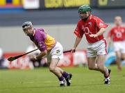 15 August 2004; Tomas Mahon, Wexford, in action against Jerry O'Connor, Cork. Guinness Senior Hurling Championship Semi-Final, Wexford v Cork, Croke Park, Dublin. Picture credit; Brian Lawless / SPORTSFILE