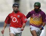15 August 2004; Ben O'Connor, Cork, in action against Keith Rossiter, Wexford. Guinness Senior Hurling Championship Semi-Final, Wexford v Cork, Croke Park, Dublin. Picture credit; Brian Lawless / SPORTSFILE