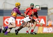 15 August 2004; Niall McCarthy, Cork, in action against Eoin Quigley, Wexford. Guinness Senior Hurling Championship Semi-Final, Wexford v Cork, Croke Park, Dublin. Picture credit; Brian Lawless / SPORTSFILE