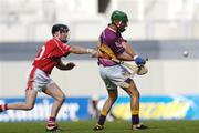15 August 2004; Keith Rossiter, Wexford, in action against Ben O'Connor, Cork. Guinness Senior Hurling Championship Semi-Final, Wexford v Cork, Croke Park, Dublin. Picture credit; Brian Lawless / SPORTSFILE