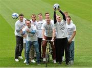 25 September 2013; Peter Cherrie, Dundalk, gets a push on his bike from League of Ireland team-mates, from left, Graham Gartland, Shelbourne, Raffaele Cretaro, Sligo Rovers, Barry Molloy, Derry City, James Chambers, Shamrock Rovers, Gearoid Morrissey, Cork City, Mick Leahy, UCD, Paul O'Connor, Drogheda United, Daire Doyle, Bray Wanderers, Jake Kelly, St. Patrick’s Athletic and Luke Byrne, Bohemians, during fundraising for Drogheda United striker Gary O’Neill who was diagnosed with testicular cancer. Picture credit: Matt Browne / SPORTSFILE