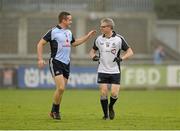 25 September 2013; Ger Brennan, Dublin speaking to Joe Brolly, Opt for Life, during the GOAL Challenge charity match. Dublin Goal challenge, Parnell Park, Dublin.  Picture credit: Barry Cregg / SPORTSFILE