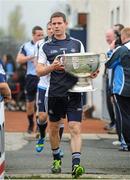25 September 2013; Dublin captain Stephen Cluxton carries the Sam Maguire cup out to the field before the GOAL Challenge charity match. Dublin Goal challenge, Parnell Park, Dublin.  Picture credit: Barry Cregg / SPORTSFILE