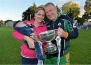 21 September 2013; Dave Morris, Corofin, Galway, holds the cup with his wife Anne and son Darragh aged 10 weeks after the game at the 2013 FBD 7s at Kilmacud Crokes GAA Club. The competition, now in its 41st year, attracted top club teams from all over Ireland and provided a day of fantastic football for GAA fans. Kilmacud Crokes GAA Club, Stillorgan, Co. Dublin. Picture credit: Barry Cregg / SPORTSFILE
