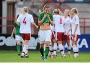 26 September 2013; Republic of Ireland's Katie McCabe shows her disappointment while the Denmark players celebrate Kamilla Jensen's goal and her side's second equalising goal. UEFA Women’s U19 First Qualifying Round Group 2, Republic of Ireland v Denmark, Tolka Park, Dublin. Picture credit: Pat Murphy / SPORTSFILE