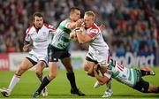 27 September 2013; Luke Marshall, Ulster, is tackled by Alberto Sgarbi, left, and Mat Berquist, Benetton Treviso. Celtic League 2013/14, Round 4, Ulster v Benetton Treviso, Ravenhill, Belfast, Co. Antrim. Picture credit: Oliver McVeigh / SPORTSFILE