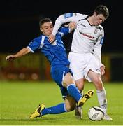 27 September 2013; Mark Hughes, Athlone Town, in action against Conor Whittle, Waterford United. Airtricity League First Division, Athlone Town v Waterford United, Athlone Town Stadium, Lissywoollen, Athlone, Co. Westmeath. Picture credit: David Maher / SPORTSFILE