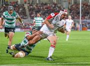 27 September 2013; Rory Best, Ulster, goes over for his sides fourth try despite the tackle of Dean Budd, Benetton Treviso. Celtic League 2013/14, Round 4, Ulster v Benetton Treviso, Ravenhill, Belfast, Co. Antrim. Picture credit: John Dickson / SPORTSFILE