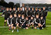 27 September 2013; Ashbourne RFC with Leinster's Leo Auva'a ahead of the half-time mini games. Celtic League 2013/14, Round 4, Leinster v Cardiff Blues, RDS, Ballsbridge, Dublin. Picture credit: Stephen McCarthy / SPORTSFILE