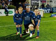 27 September 2013; Leinster captain Jamie Heaslip with mascots Jamie McLoughlin, age 10, from Old Belvedere RFC, left, and Charlie Redmond Murray, age 8, from St Colmcilles SNS, Knocklyon. Celtic League 2013/14, Round 4, Leinster v Cardiff Blues, RDS, Ballsbridge, Dublin. Picture credit: Stephen McCarthy / SPORTSFILE