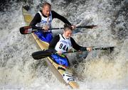 28 September 2013; Jenny Egan and Enda Rothwell, Tullow Kayak Club, in action on the Senior Racing Kayak Double during the 2013 Liffey Descent. Lucan Village, River Liffey, Dublin. Picture credit: Ray Lohan / SPORTSFILE