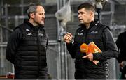 18 October 2024; Football Review Committee member Éamonn Fitzmaurice, right, and Michael Murphy at the Allianz GAA Football Interprovincial Championship semi-final match between Leinster and Connacht at Croke Park in Dublin. Photo by Piaras Ó Mídheach/Sportsfile