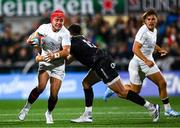 18 October 2024; Mike Lowry of Ulster is tackled by Owen Williams of Ospreys during the United Rugby Championship match between Ulster and Ospreys at Kingspan Stadium in Belfast. Photo by Shauna Clinton/Sportsfile