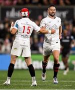 18 October 2024; John Cooney, right, is congratulated by Ulster teammate Mike Lowry after kicking a conversion during the United Rugby Championship match between Ulster and Ospreys at Kingspan Stadium in Belfast. Photo by Ramsey Cardy/Sportsfile