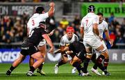 18 October 2024; Mike Lowry of Ulsteris tackled by Lewis Lloyd of Ospreys during the United Rugby Championship match between Ulster and Ospreys at Kingspan Stadium in Belfast. Photo by Shauna Clinton/Sportsfile