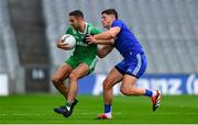19 October 2024; James McCarthy of Leinster is tackled by Colm O Callaghan of Munster during the Allianz GAA Football Interprovincial Championship Shield Final match between Leinster and Munster at Croke Park in Dublin. Photo by Shauna Clinton/Sportsfile