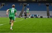 19 October 2024; Darren Gallagher of Leinster and Ian Maguire of Munster contest the throw-in at the start of the second half while Daniel Flynn of Leinster enters the pitch from the sideline during the Allianz GAA Football Interprovincial Championship Shield Final match between Leinster and Munster at Croke Park in Dublin. Photo by Stephen Marken/Sportsfile