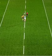 19 October 2024; Niall Grimley of Ulster and Aidan O’Shea of Connacht contest a throw in to start a quarter as referee David Coldrick looks on during the Allianz GAA Football Interprovincial Championship Final match between Connacht and Ulster at Croke Park in Dublin. Photo by Piaras Ó Mídheach/Sportsfile