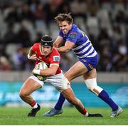 19 October 2024; Mike Haley of Munster attempts to slip DHL Stormers captain Dan du Plessis tackle during the United Rugby Championship match between DHL Stormers and Munster at DHL Stadium in Cape Town, South Africa. Photo by Shaun Roy/Sportsfile