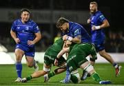 19 October 2024; Andrew Porter of Leinster is tackled by Connacht players Cian Prendergast, left, and Sean O’Brien during the United Rugby Championship match between Connacht and Leinster at Dexcom Stadium in Galway. Photo by Seb Daly/Sportsfile