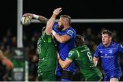 19 October 2024; RG Snyman of Leinster is tackled by Connacht players Peter Dooley, left, and Cian Prendergast during the United Rugby Championship match between Connacht and Leinster at Dexcom Stadium in Galway. Photo by Seb Daly/Sportsfile
