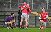 20 October 2024; Pádraig Pearses players Emmett Kelly and Niall Carty, behind, celebrate after their side's victory in the Roscommon County Senior Club Football Championship final match between Pádraig Pearses and Roscommon Gaels at Dr Hyde Park in Roscommon. Photo by Piaras Ó Mídheach/Sportsfile