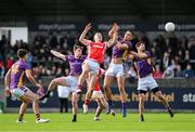 20 October 2024; Con O’Callaghan of Cuala in action against Kilmacud Crokes' players, left to right, Paddy O’Connor, Michael Mullin, Theo Clancy, and Rory O’Carroll during the Dublin County Senior Club Football Championship final match between Cuala and Kilmacud Crokes at Parnell Park in Dublin. Photo by Daire Brennan/Sportsfile