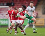 20 October 2024; Ryan O'Leary of Cork City in action against David Ngesi of St Patrick’s Athletic during the EA SPORTS MU15 LOI Michael Hayes Cup match between Cork City and St Patrick’s Athletic at Turner’s Cross in Cork. Photo by Michael P Ryan/Sportsfile