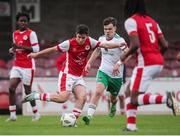 20 October 2024; Jason Spelman of St Patrick’s Athletic in action against Ryan O'Leary of Cork City during the EA SPORTS MU15 LOI Michael Hayes Cup match between Cork City and St Patrick’s Athletic at Turner’s Cross in Cork. Photo by Michael P Ryan/Sportsfile