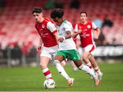 20 October 2024; David Dunne of Cork City in action against Josh O'Connor of St Patrick’s Athletic during the EA SPORTS MU15 LOI Michael Hayes Cup match between Cork City and St Patrick’s Athletic at Turner’s Cross in Cork. Photo by Michael P Ryan/Sportsfile