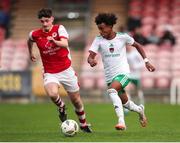 20 October 2024; David Dunne of Cork City in action against Josh O'Connor of St Patrick’s Athletic during the EA SPORTS MU15 LOI Michael Hayes Cup match between Cork City and St Patrick’s Athletic at Turner’s Cross in Cork. Photo by Michael P Ryan/Sportsfile