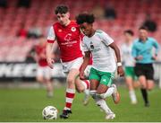 20 October 2024; David Dunne of Cork City in action against Josh O'Connor of St Patrick’s Athletic during the EA SPORTS MU15 LOI Michael Hayes Cup match between Cork City and St Patrick’s Athletic at Turner’s Cross in Cork. Photo by Michael P Ryan/Sportsfile